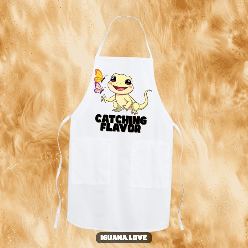 Funny Kawaii Iguana Apron displays a smiling iguana character chasing a butterfly, adding a charming and humorous touch to culinary tasks.