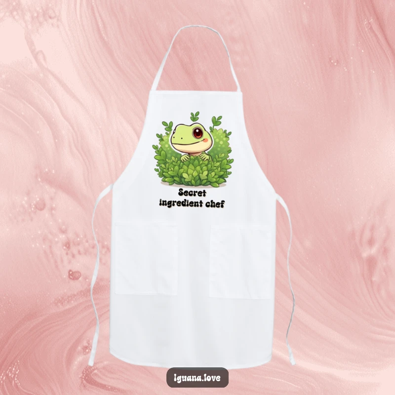 Funny apron featuring a playful iguana character peeking from behind foliage, adding a touch of humor to the kitchen.
