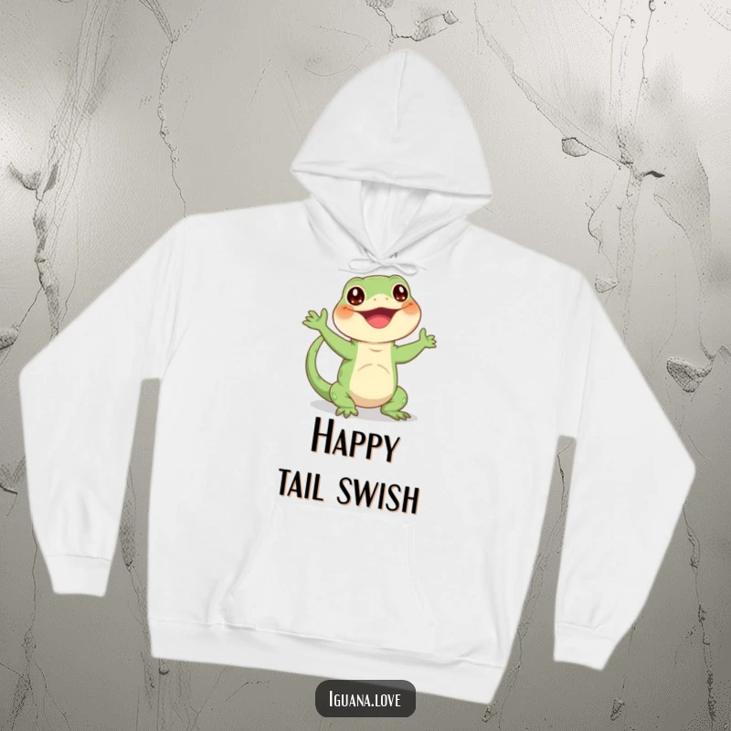 Funny hoodie featuring a happy iguana character enthusiastically waving its tail, offering comfort and cheerful design.