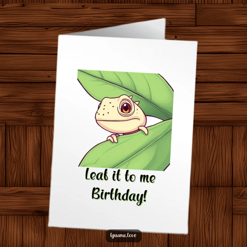 Funny Free Printable Birthday Card: Curious iguana peeking playfully from behind a large green leaf, ready to deliver birthday wishes.