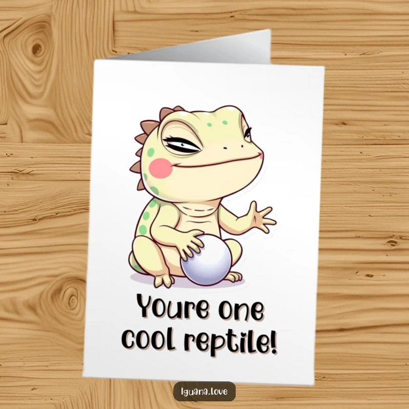 Funny Free Printable Birthday Card: An iguana winking playfully while skillfully balancing a tiny ball, ready for a birthday celebration.