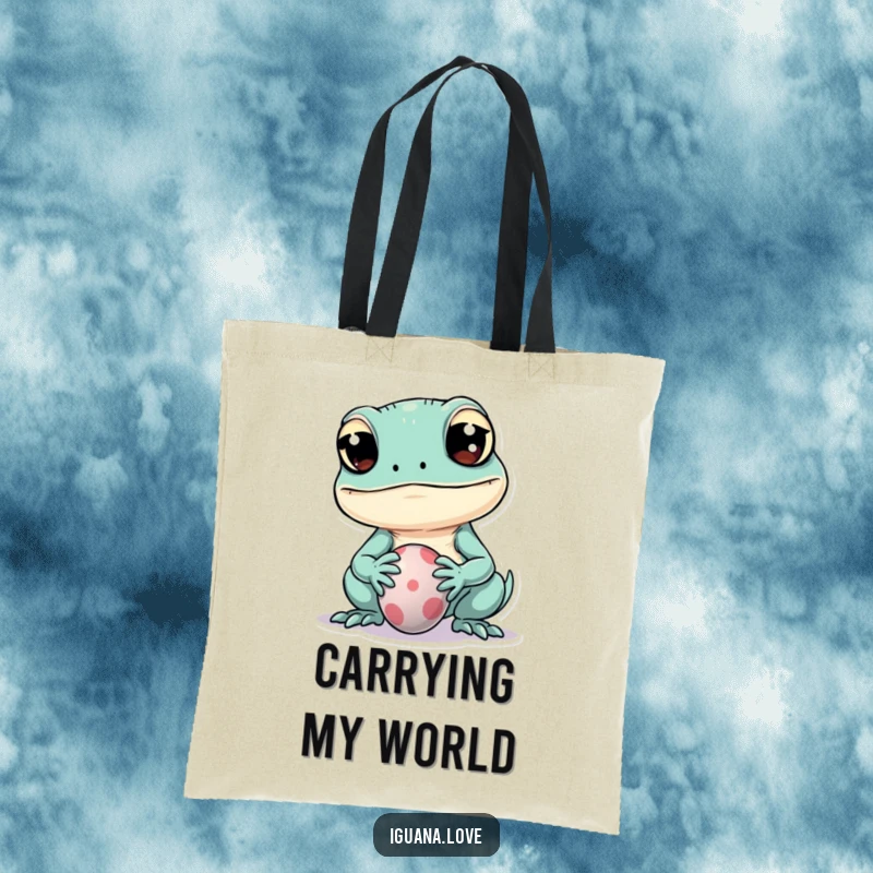 Funny tote bag depicting a kawaii iguana with wide eyes playfully balancing a small ball on its snout, perfect for daily use.